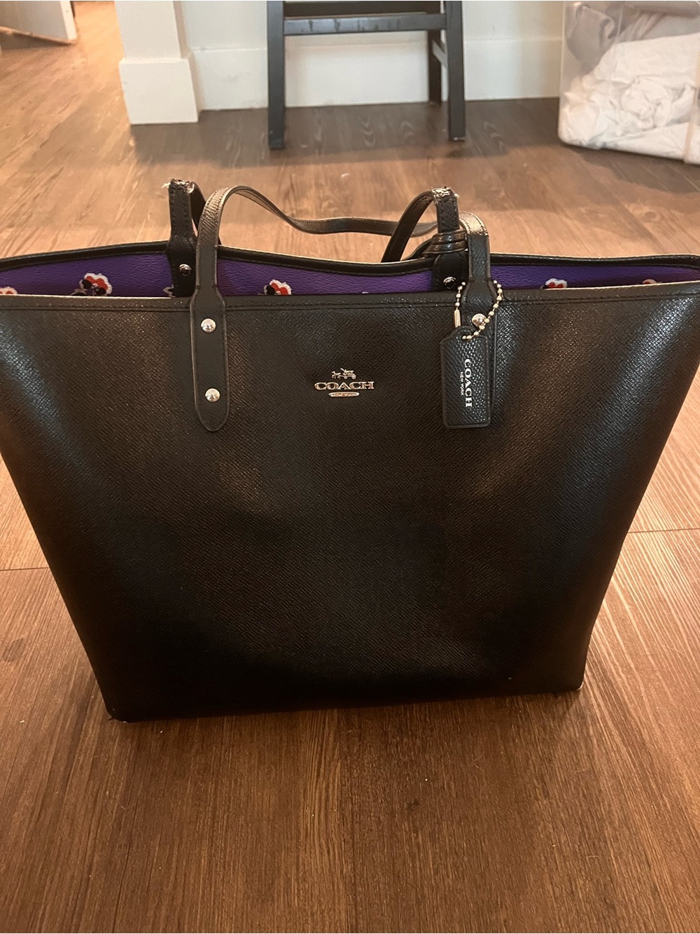 Coach Black Leather Tote with Purple Lining and Floral Accent